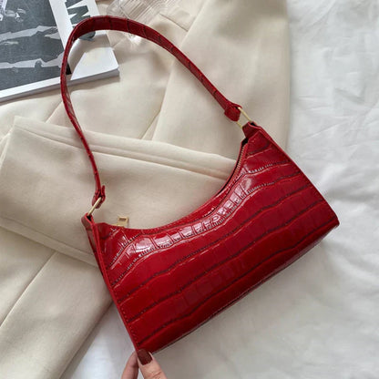 Maisie | Shiny shoulder bag with alligator pattern