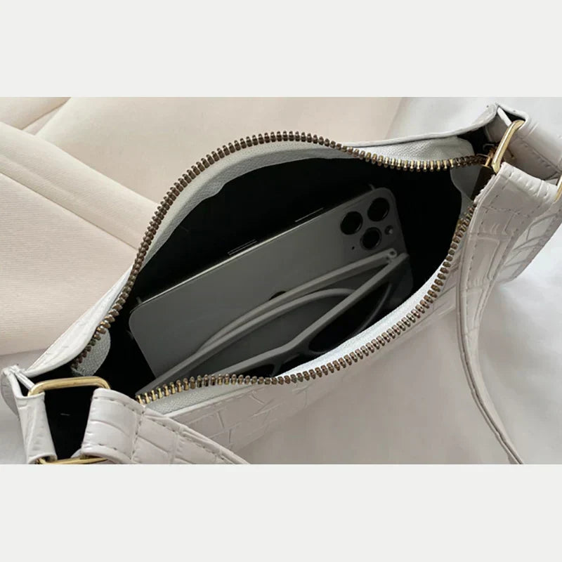 Maisie | Shiny shoulder bag with alligator pattern